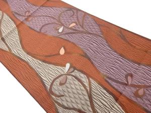 曲線に唐草模様織出し名古屋帯